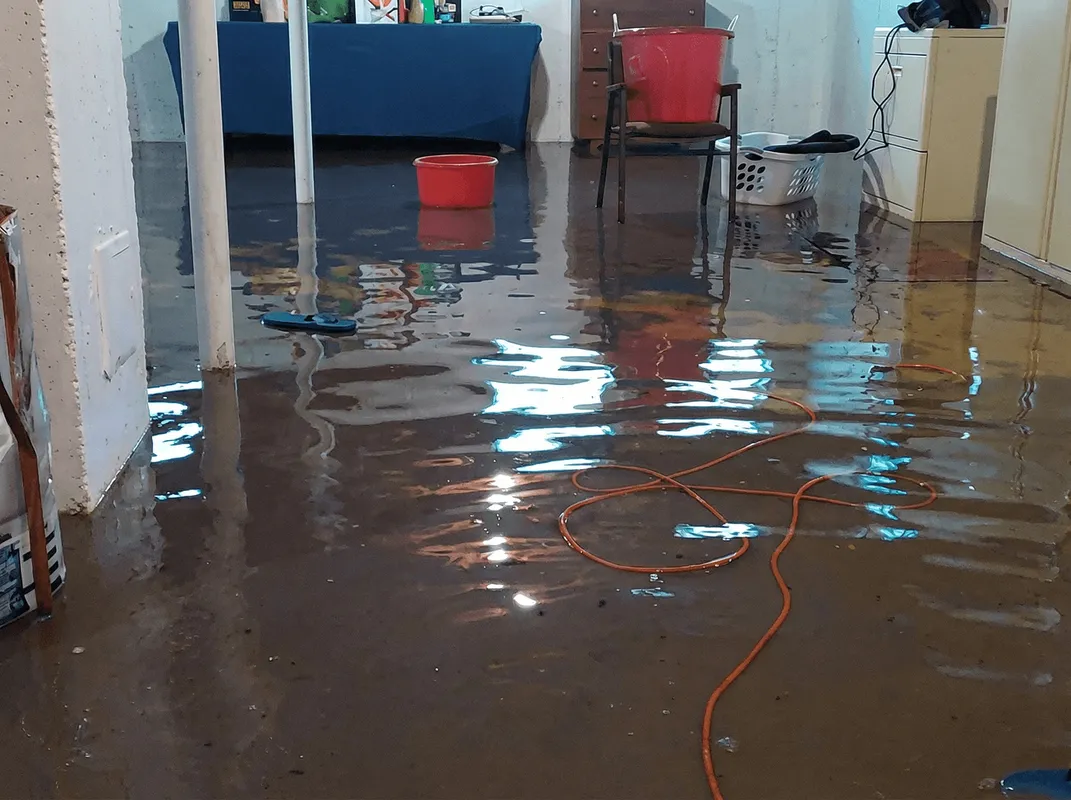 Basement with boiler, cabinets and washing machine completely flooded in Oklahoma City, OK